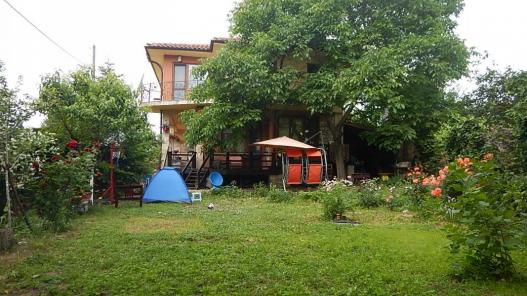 The yard with flowers, bushes, a barbeque area - properties in Pomorie Id 140 
