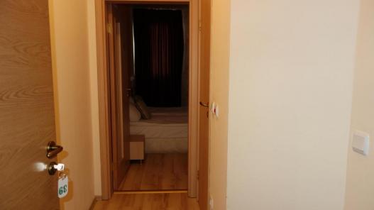 a corridor with a storeroom ID 148 