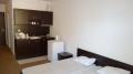 Спальная и кухонная зона в одной из продающихся студий в комплексе Vigo Beach