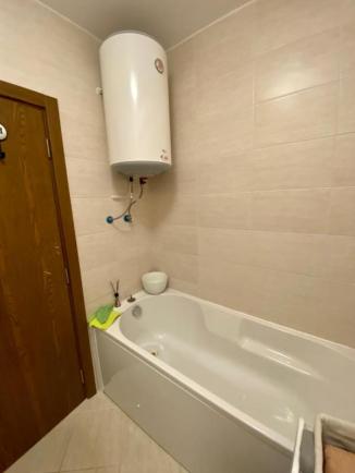 Id 483 Bathroom with bathtub and boiler
