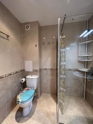 Id 521 Bathroom with shower cabin and boiler