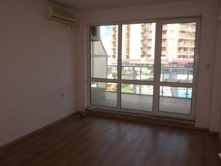 Bedrrom with big windows in the apartment for sale in Sunny Beach